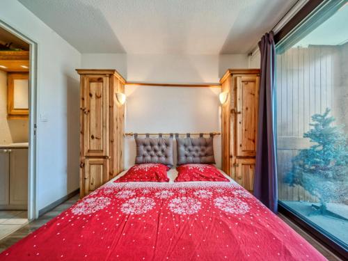 En eller flere senge i et værelse på Apartment Soyouz Vanguard-101 by Interhome