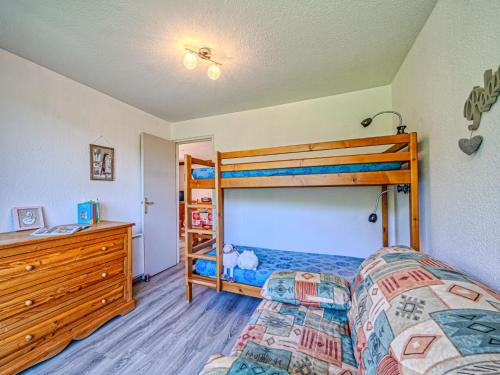 En eller flere senge i et værelse på Apartment Soyouz Vanguard-101 by Interhome