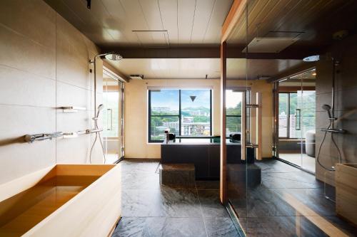 Koupelna v ubytování Arima Onsen Takayamaso Hanano