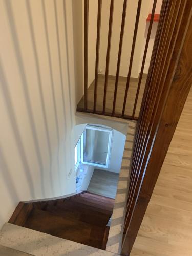 an empty refrigerator in the middle of a staircase at LA CASA DEL BORGO in Campoli Appennino