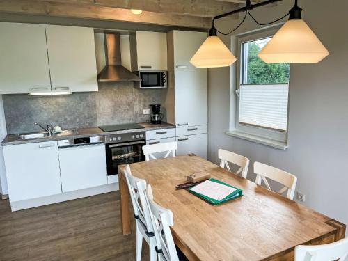 Η κουζίνα ή μικρή κουζίνα στο Holiday Home Geesthof-1 by Interhome