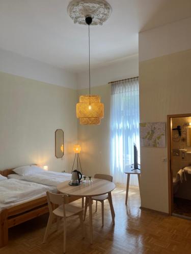 Postel nebo postele na pokoji v ubytování Hotel Villa Arnold