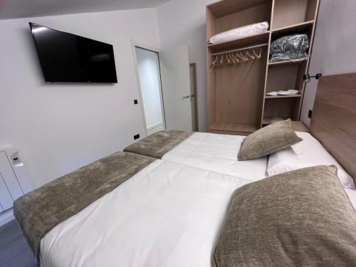 Ένα ή περισσότερα κρεβάτια σε δωμάτιο στο Apartaments Turistics El Buner