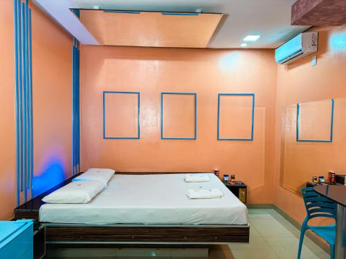 Een bed of bedden in een kamer bij Rodotel Vênus Prime