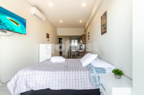 Postel nebo postele na pokoji v ubytování Comfortable Villa Morra Loft