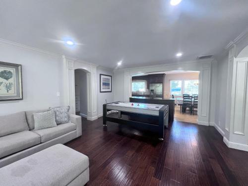 a living room with a pool table in it at Destination #03 in Fullerton