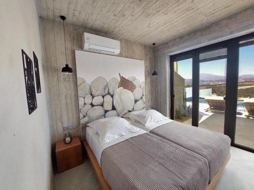 Postel nebo postele na pokoji v ubytování Marnos Luxury Villas