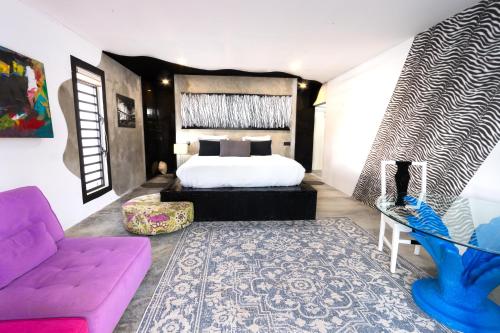 Postel nebo postele na pokoji v ubytování Thuishaven boutique mini-resort - no kids