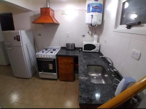 Køkken eller tekøkken på Posada Del Montañés Cabañas