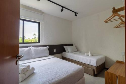 Postel nebo postele na pokoji v ubytování Gamboa - Patacho - C103