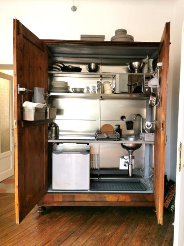 a kitchen filled with lots of pots and pans at Archè in Ivrea