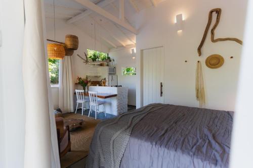 Katil atau katil-katil dalam bilik di Oka Maraú I Charming Bungalows