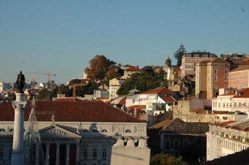 a view of a city with buildings at Augusta Boutique House in Lisbon