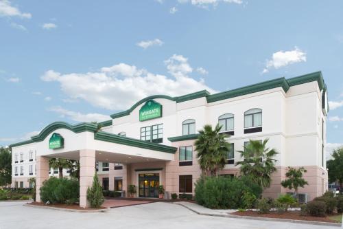 a rendering of the front of a hotel at Wingate by Wyndham Houma in Houma