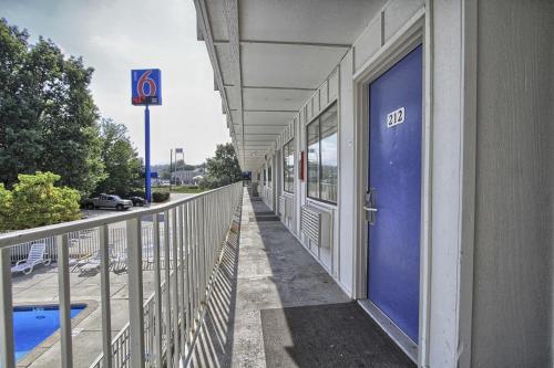 a blue door on the side of a building at Motel 6-New Cumberland, PA - Harrisburg - Hershey South in New Cumberland