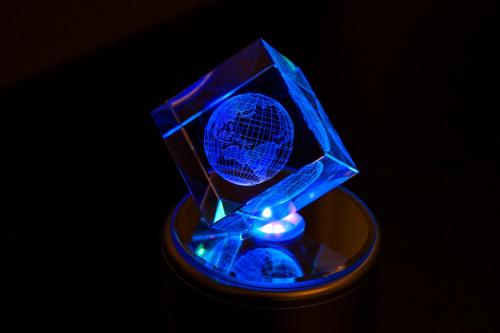 a blue lighted trophy sitting on top of a table at ホテルディオールセブン郡山 in Koriyama