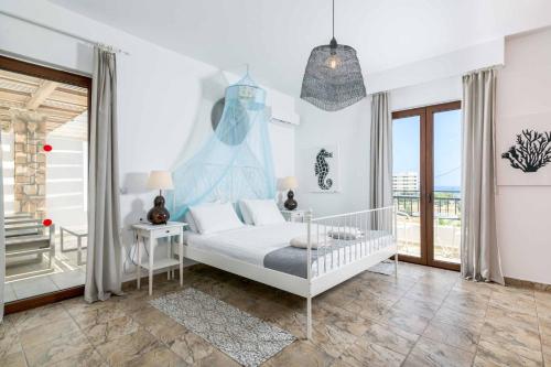 Ένα ή περισσότερα κρεβάτια σε δωμάτιο στο Villa Krini Panos
