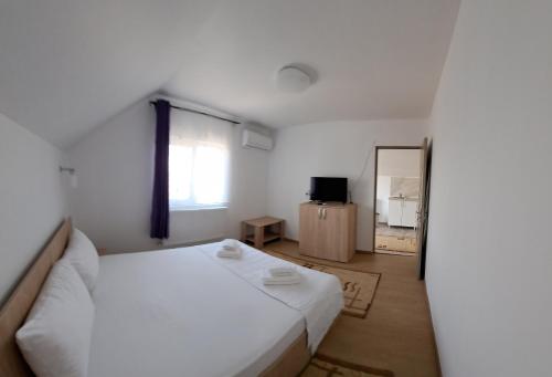 Postel nebo postele na pokoji v ubytování Casa Gabi