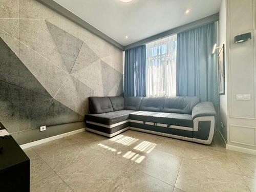 Posezení v ubytování ApartPoltava PREMIUM ДИЗАЙН закритий ЖК ПИЛИПА ОРЛИКА 26