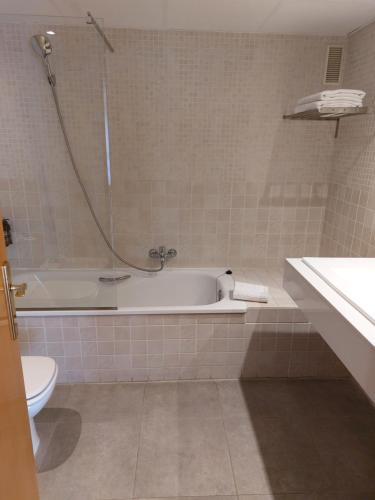 Ванная комната в Apartamentos Plaza Picasso