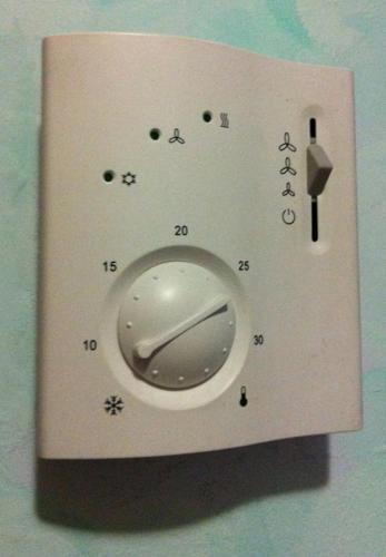 a clock on a wall with numbers and aperature at Eco Art Hotel Statuto in Turin