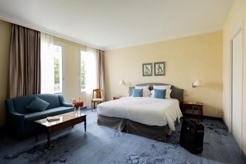 Postel nebo postele na pokoji v ubytování Relais de Margaux - Hôtel, Golf & Spa
