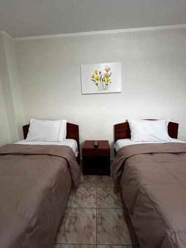 Ένα ή περισσότερα κρεβάτια σε δωμάτιο στο Hostal El Gran Gocta
