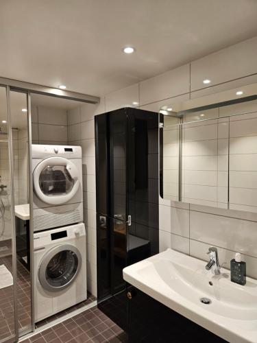 Koupelna v ubytování Modern apartment in city center