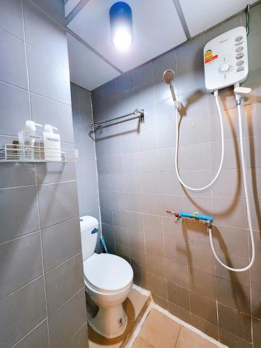 a bathroom with a toilet and a shower at 805-STP Homely room Free Wi-Fi and Near BTS line in Bangkok