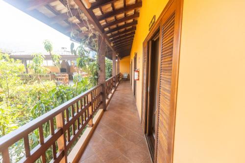 a balcony of a building with a balcony at Pousada Mata Atlantica Juquehy in Juquei