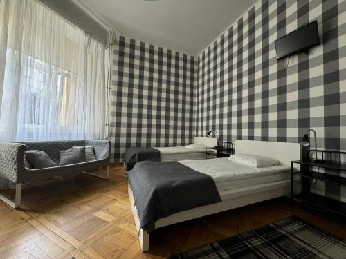 Postel nebo postele na pokoji v ubytování Cent Hostel