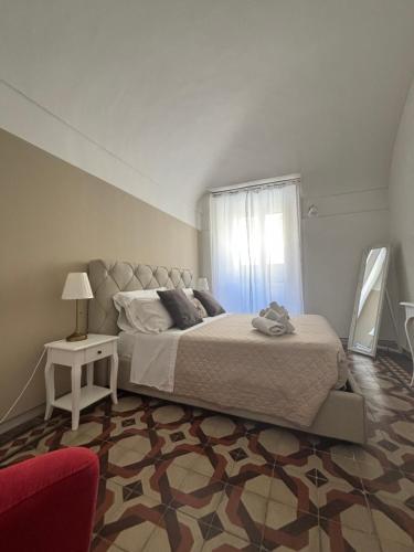 Postel nebo postele na pokoji v ubytování Immacolata Rooms