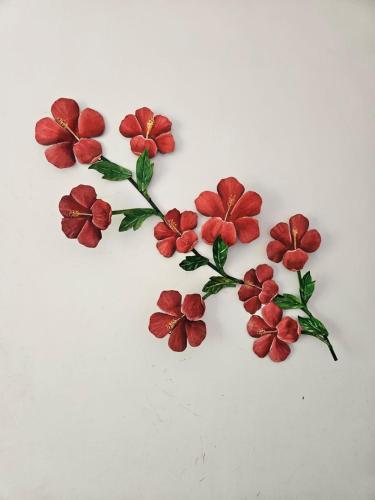 a group of red flowers on a white background at Pousada Éden in Angra dos Reis