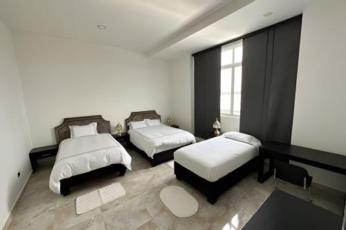 Postel nebo postele na pokoji v ubytování Rio-ApartaHotel-Centro