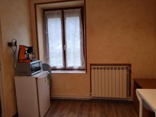 Kuchyň nebo kuchyňský kout v ubytování Logement 100 m2 3 chambres 2 salles de bains