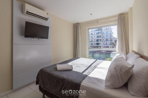 Giường trong phòng chung tại Apto entre a Praia do Braga e do Forte - FMI0218