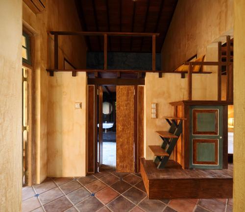 a room with a bunk bed in a house at Sama Retreats - Kosgoda in Kosgoda