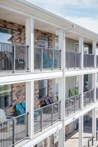 a row of balconies on a building at Kasa Gold Coast Inn Traverse City in Traverse City