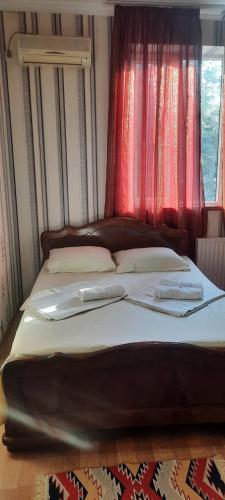 Postel nebo postele na pokoji v ubytování Guesthouse Imma in Old Tbilisi
