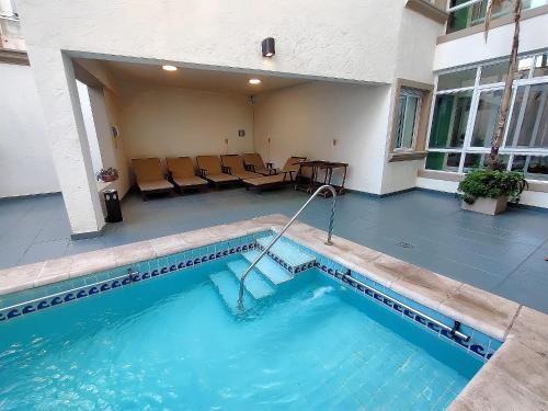 Πισίνα στο ή κοντά στο Cóndor Suites Apart Hotel