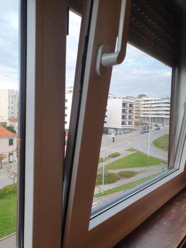 a window with a view of a street at BEST OF NATURE 1, Matosinhos beach, Porto city parc, METRO in Matosinhos