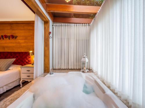 Hotel Cabanas Tio Müllerにあるベッド