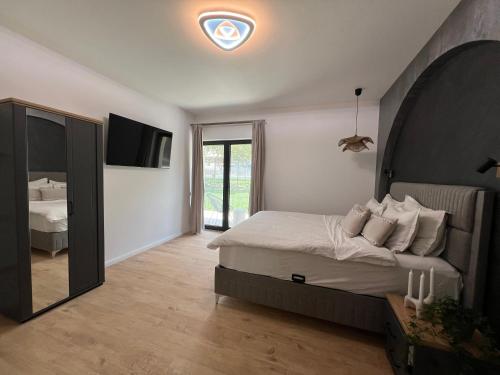 Postel nebo postele na pokoji v ubytování On Top Villa