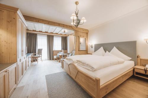 Postel nebo postele na pokoji v ubytování Hotel Gaspingerhof