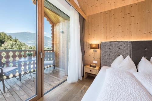 Postel nebo postele na pokoji v ubytování Niederthalerhof Chalets