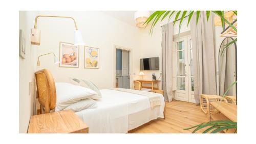 Postel nebo postele na pokoji v ubytování Green Guest House Alghero
