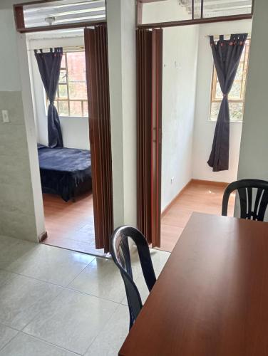 Katil atau katil-katil dalam bilik di Apartamento Portal americas