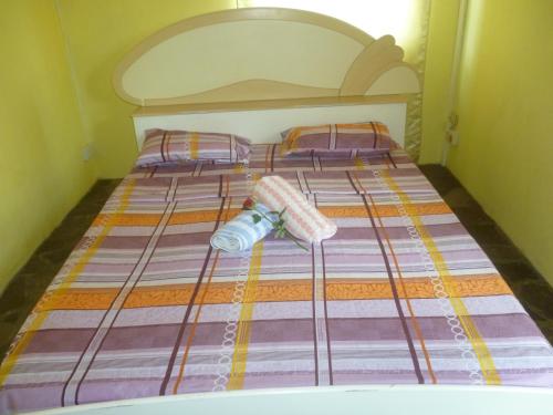 Postel nebo postele na pokoji v ubytování Chez Clenya Guesthouse