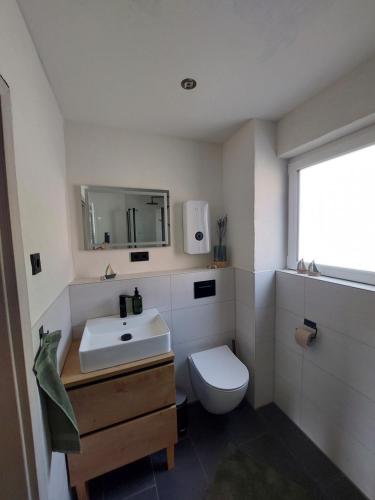 Ένα μπάνιο στο Ferienwohnung Auszeit Osterode
