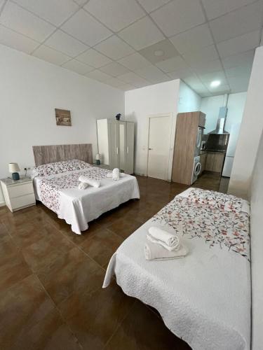 A bed or beds in a room at Bécquer 3
